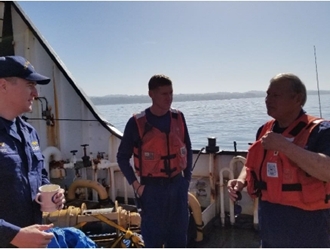 Commanding Officer Jeff West with Coast Guard Auxiliarist Chuck Cobery (right) and crew member from Aspen during NSWB 2019